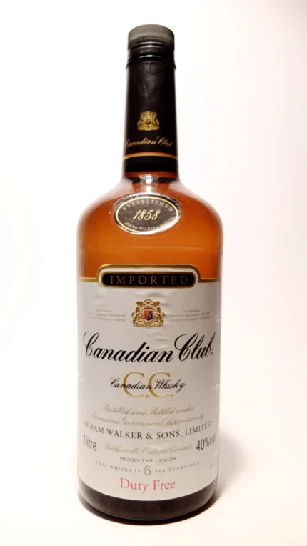 Canadian Club 6YO Blended Canadian Whisky bottle, 1990s vintage, featuring retro label design and 75cl size.