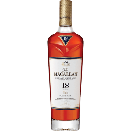 A bottle of Macallan 18 Year Double Cask with its iconic golden label and rich amber liquid.